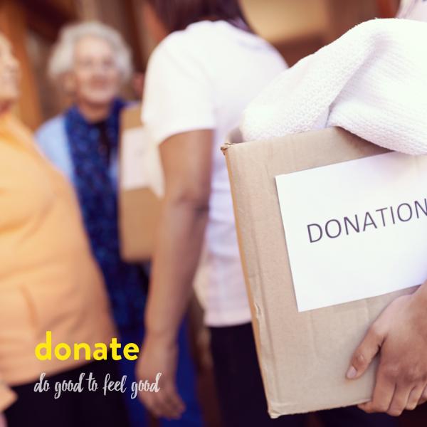 in the foreground a box full of clothes is labeled Donation, in the background some older women talk. In the Corner some text reads "Donate do good to feel good"