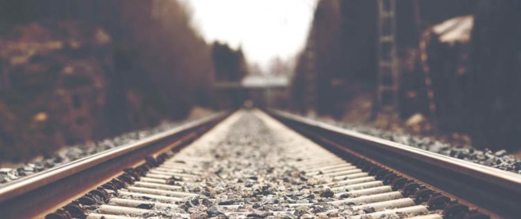 Photo of empty railroad tracks during the day